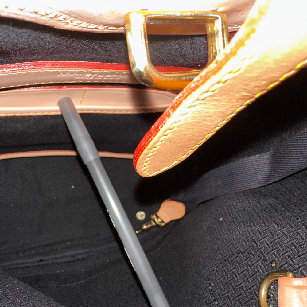 Dooney & Bourke
DOONEY & BOURKE VINTAGE CABRIOLET BUCKET BAG in Hunter Green - Picture 8 of 10